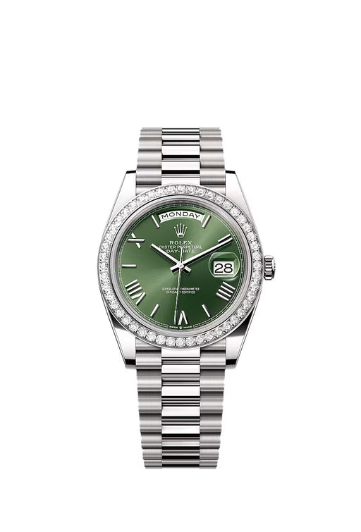 Rolex Day-Date 40 228349RBR in 18 kt white gold with olive green dial, diamond-set bezel, and President bracelet.