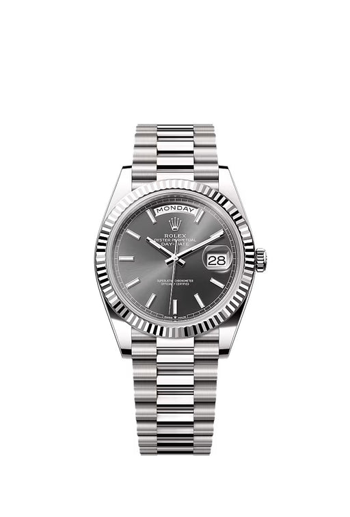 Rolex Day-Date 40 228239 in 18 kt white gold with slate dial, fluted bezel, and President bracelet.