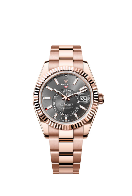 Rolex Sky-Dweller 336935 in 18 ct Everose gold with 42mm case, slate ombre dial, fluted bezel, and Oyster President bracelet.