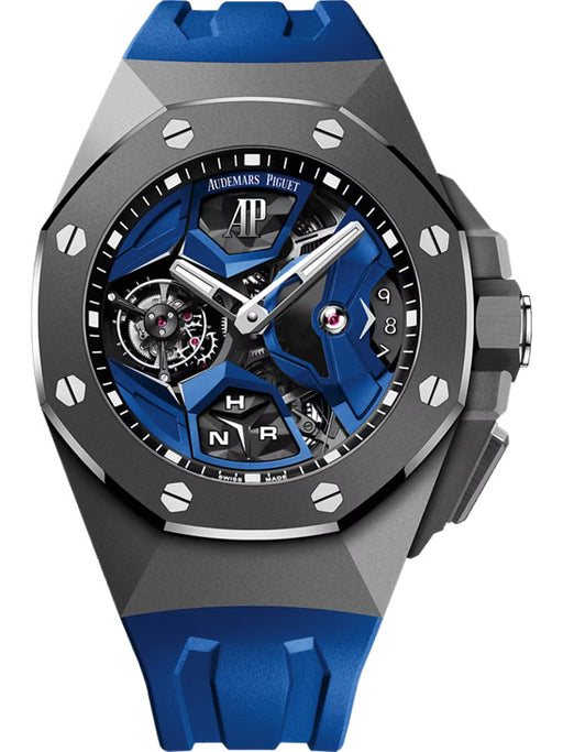 Audemars Piguet Royal Oak Concept Flying Tourbillon GMT watch with a titanium and grey ceramic case, blue rubber strap, and exposed blue movement architecture.
